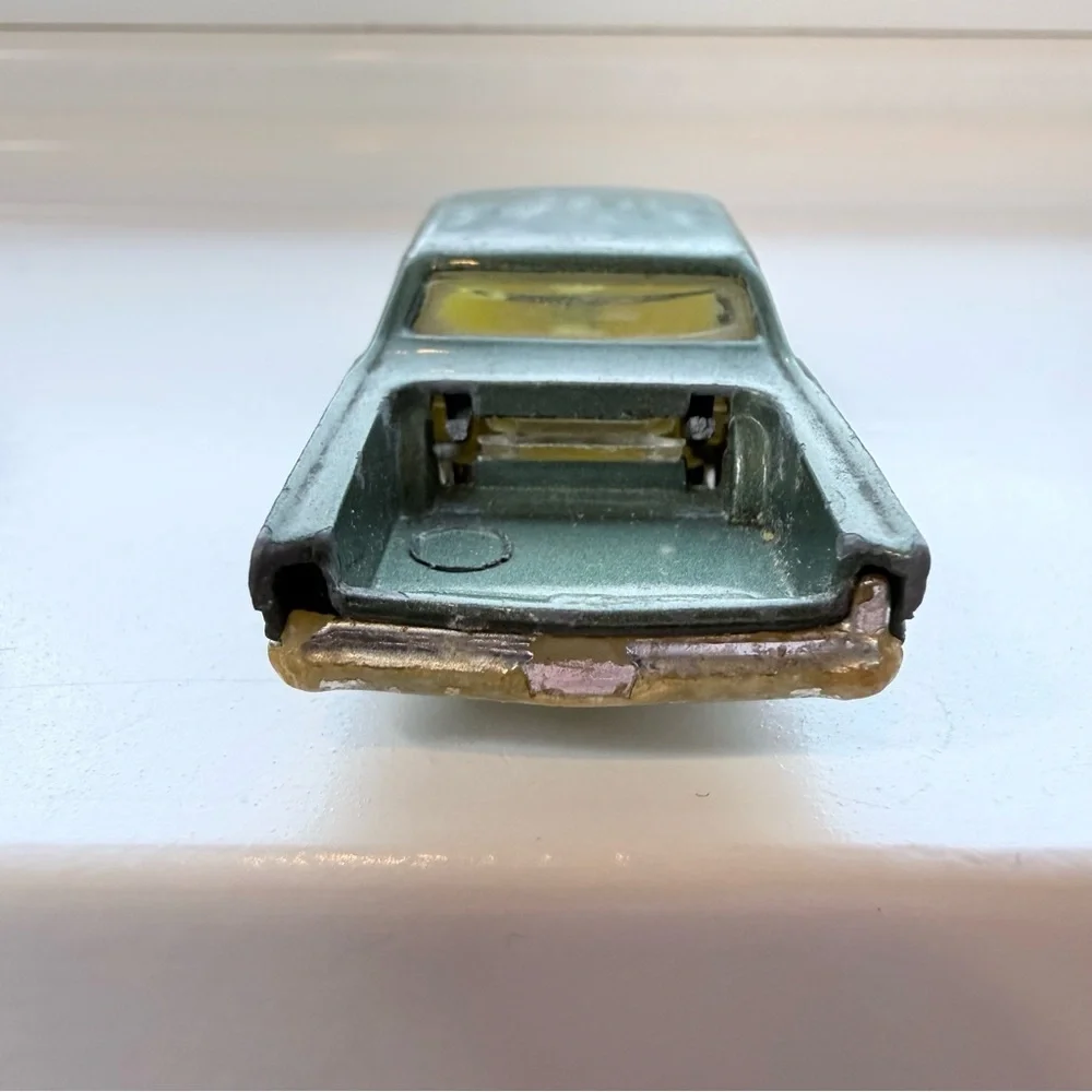 Vintage Husky Oldsmobile Starfire Coupe die-cast toy car rare green
